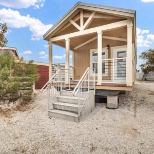 The Scottsdale
Southwestern/desert-modern 640-sqft park model. Honey-wood cabinets, barn-door closet, rustic-wood-tile shower, full island with seating.